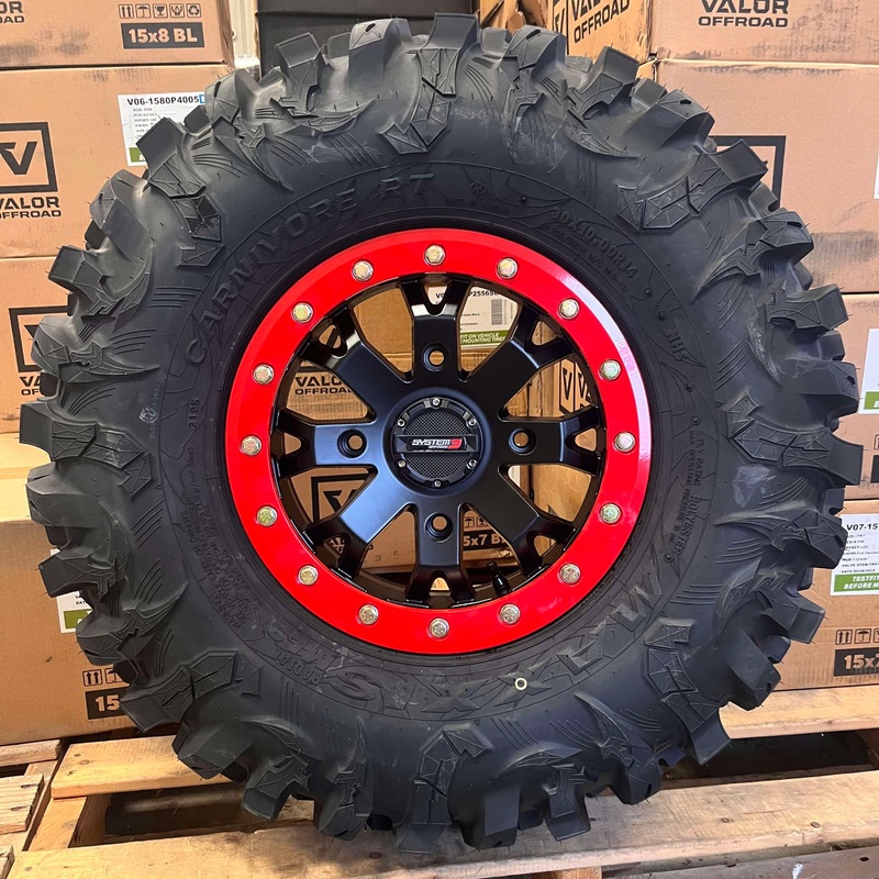 System 3 SB4 Beadlocks W/ Red rings mounted on Maxxis Carnivore RT Tires