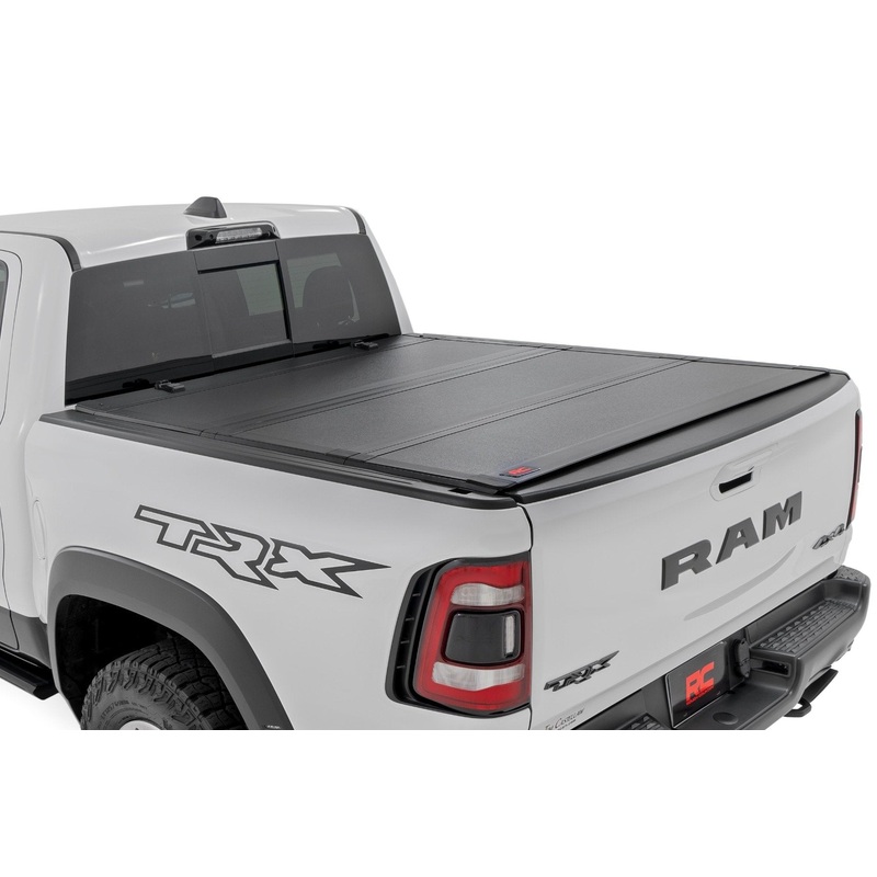Rough Country | Hard Tri-Fold Flip Up Fold Bed Cover | 5’7″ Bed | Ram 1500 (19-26)/1500 TRX (21-24)  | 49320550