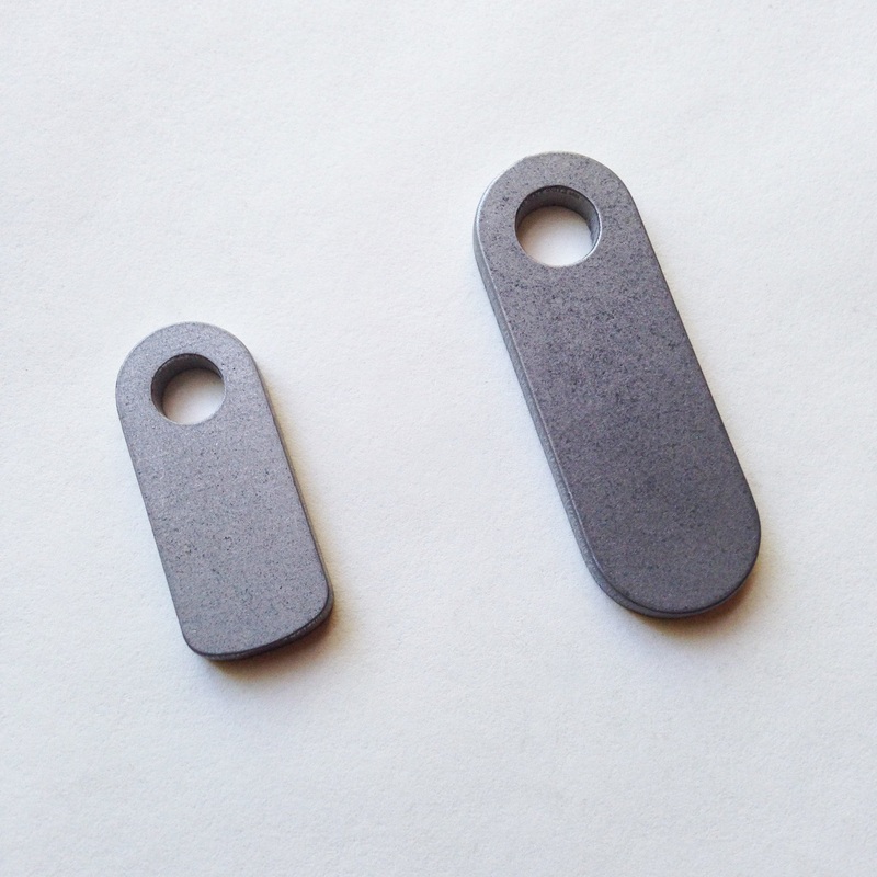 Rack tabs, untrimmed for M5 and M6 bolts – 2 & 10-packs