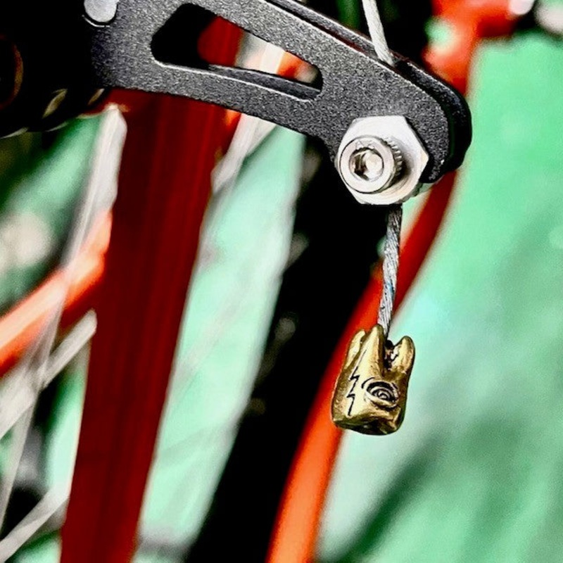 HATCHET Brass Cable End – Gold Back Teeth